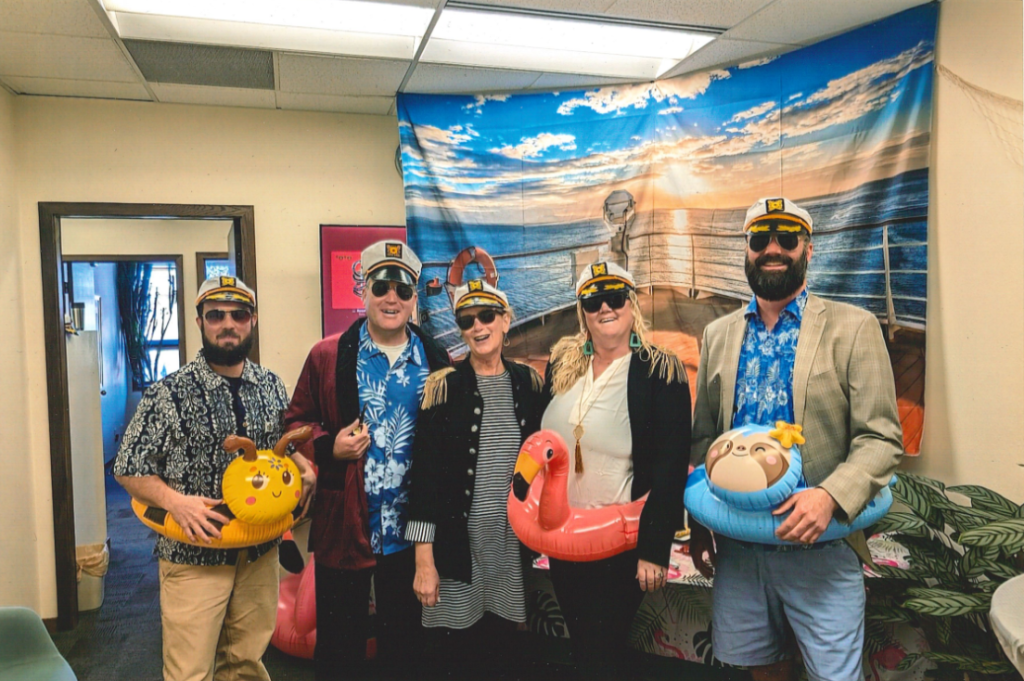 Image of Routt County Planning Department staff in captains hats for Halloween.